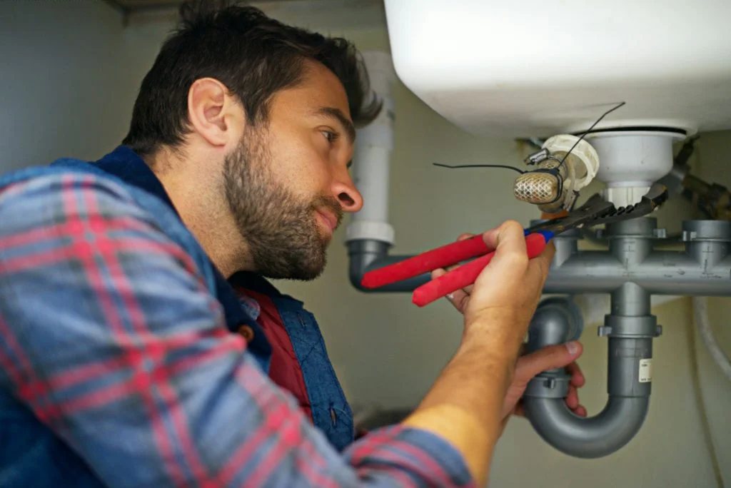 Skilled_plumbers_ensuring_reliable_water_supply